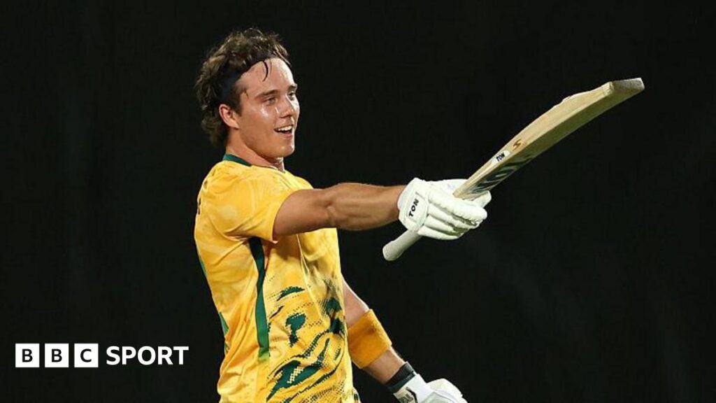 Dewald Brevis celebrating a century for South Africa v Australia