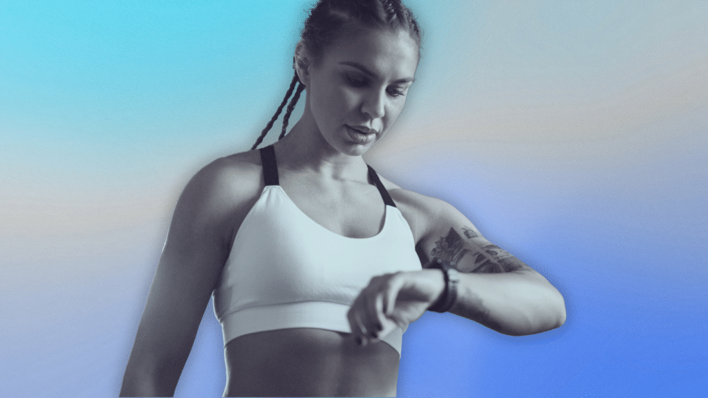 woman checking resting heart rate to determine overtraining