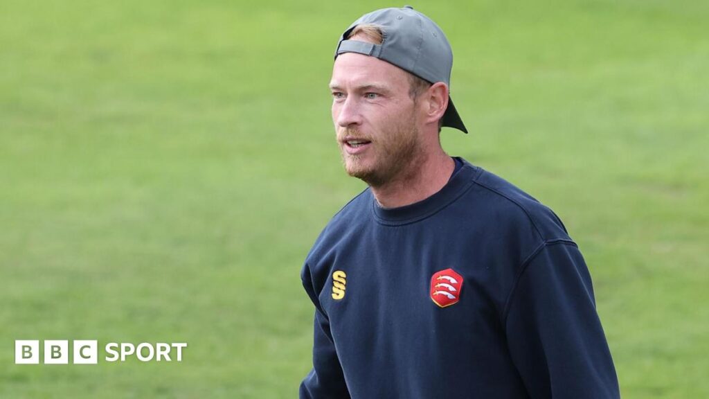 Tom Westley warming up before a game for Essex