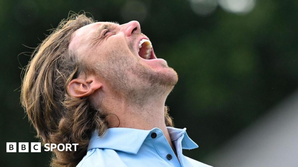 Tommy Fleetwood lets out a roar of delight after winning the Tour Championship in Atlanta