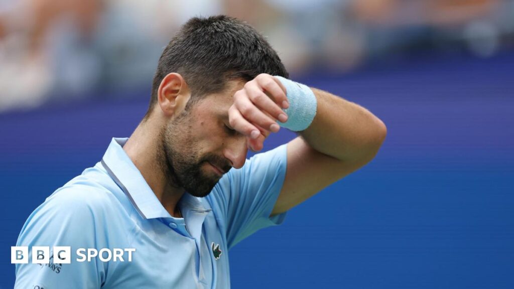 Novak Djokovic wipes his brow at the 2025 US Open