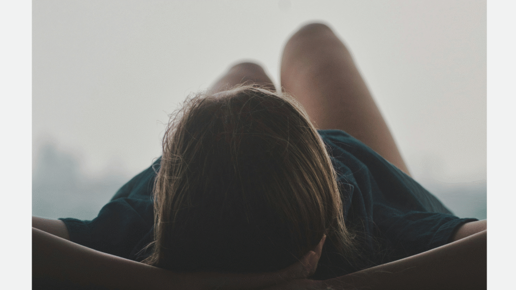 Woman lying down calm and relaxed