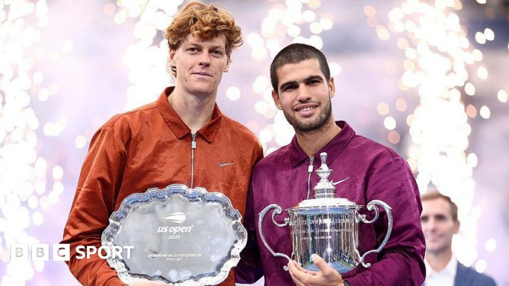 Jannik Sinner and Carlos Alcaraz show off their trophies after the US Open