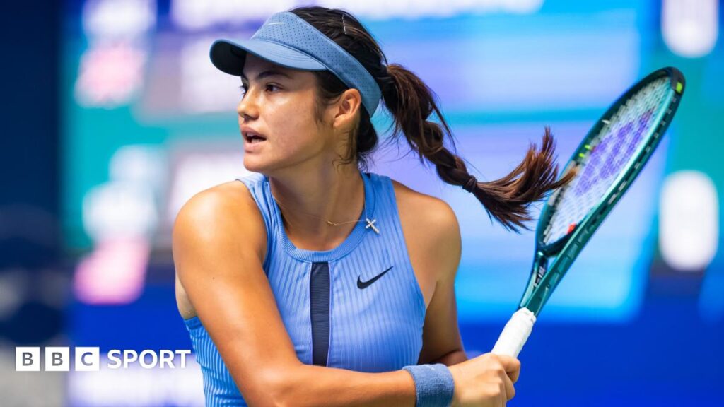 Emma Raducanu hits a forehand