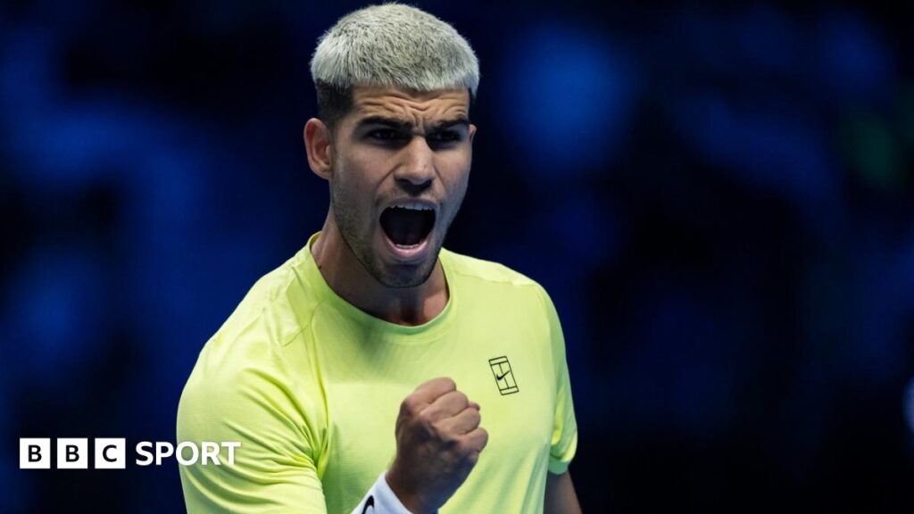 ATP Finals 2025: Carlos Alcaraz beats Alex de Minaur in Turin opener Carlos Alcaraz celebrates with a clenched fist