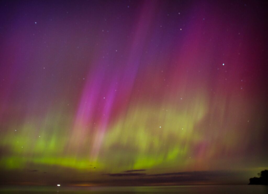 Where to See the Northern Lights Tonight Aurora Borealis over Lake Erie during a solar storm